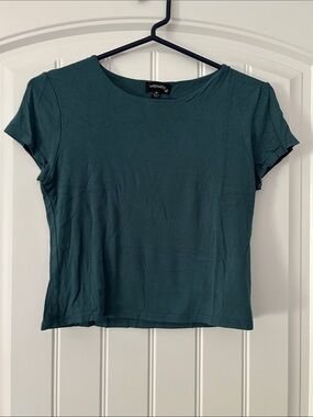 Originality Lined Short Sleeve Teal T-shirt
Women’s Medium
